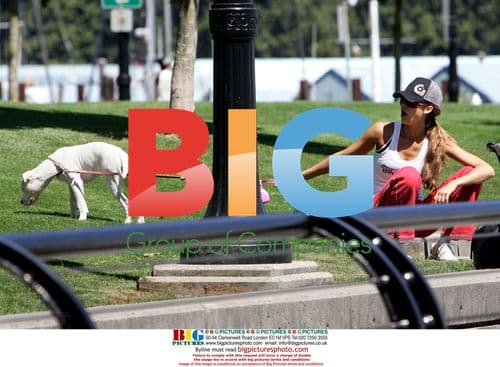 Jessica Alba plays with puppy in Vancouver