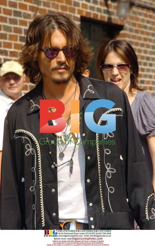 Johnny Depp Meets Fans Outside Letterman