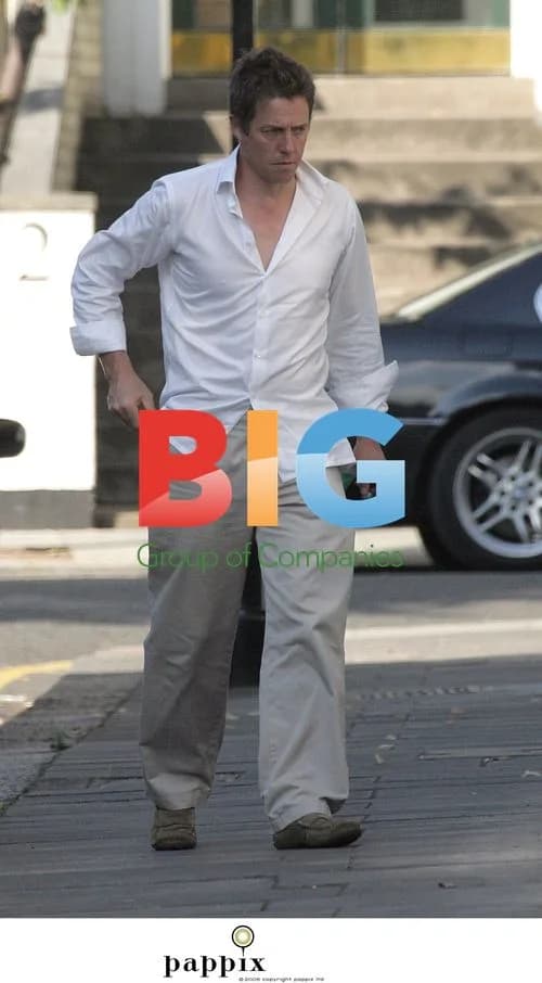 Hugh Grant Arrives Home with Prescription
