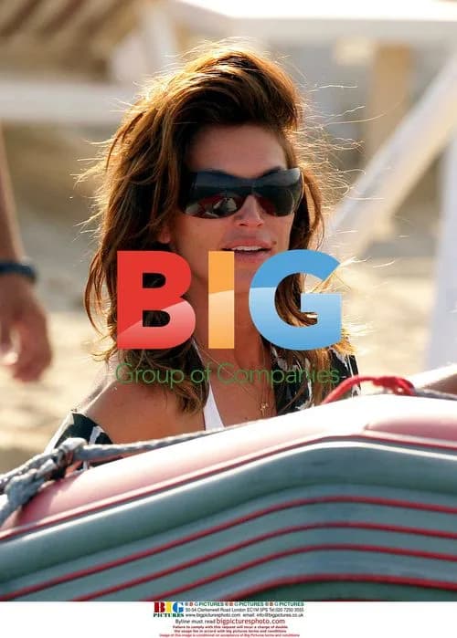 Cindy Crawford Relaxes on Beach with Husband