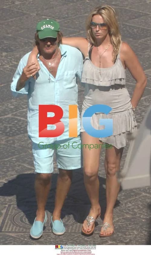Rod Stewart with fiancee Penny Lancaster and son
