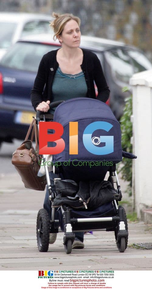 Actress Kerrie Taylor out with baby in North London