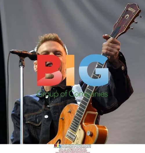 Bryan Adams on stage at Galpharm Stadium