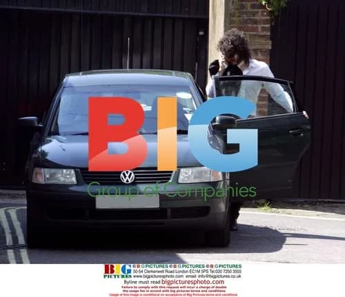 Russell Brand leaves Kate Moss's house