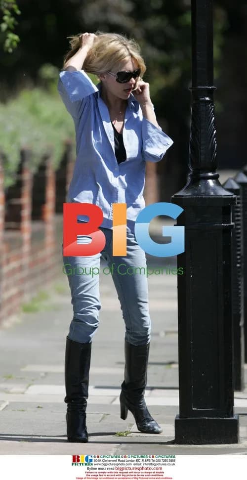 Russell Brand leaves Kate Moss's house
