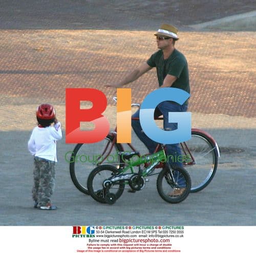 Brad Pitt and son Maddox bike ride in Namibia