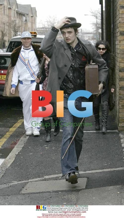 Pete Doherty leaves London home with friends