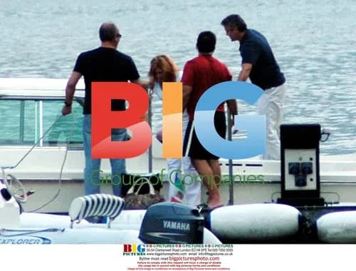 George Clooney on Boat in Lake Como