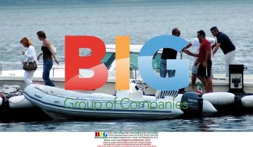 George Clooney boating on Lake Como