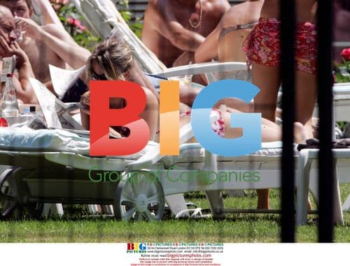 Coleen McLoughlin Sunbathing in Germany