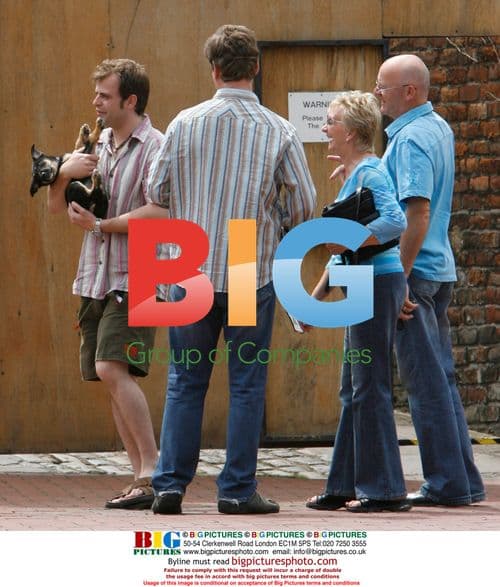 Simon Gregson with dog on Coronation Street set