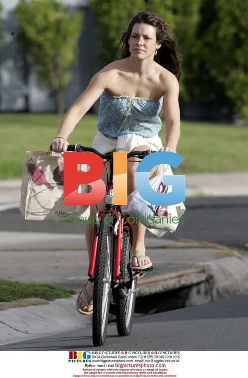 Evangeline Lilly Rides Bike to Shops