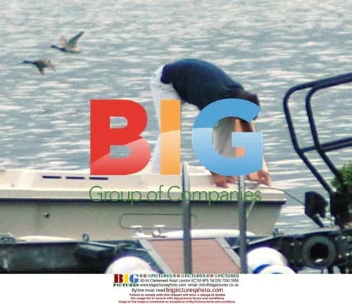 George Clooney Prepares Boat on Lake Como