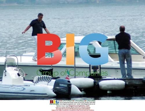 George Clooney Readying Boat on Lake Como