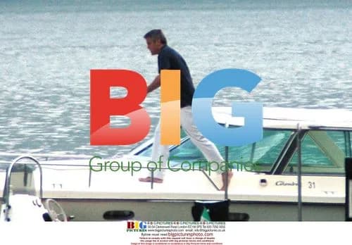 George Clooney prepping his boat on Lake Como