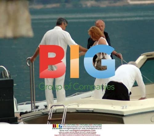 George Clooney Returns to Dock in Lake Como