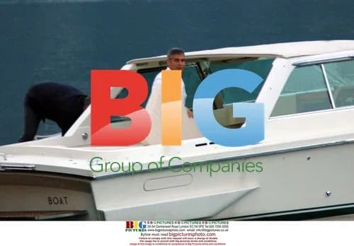 George Clooney Returns to Dock on Lake Como
