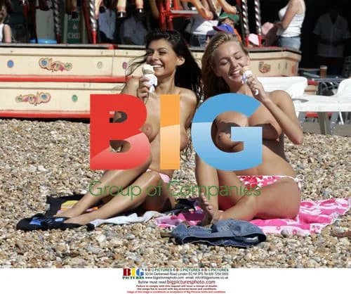 Hayley Marie and Claire Sunbathe Topless on Beach