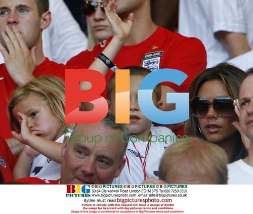 Victoria Beckham with sons at England v Ecuador match