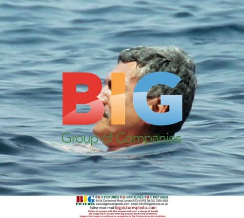 Massimo D'Alema on holiday with wife in Ponza