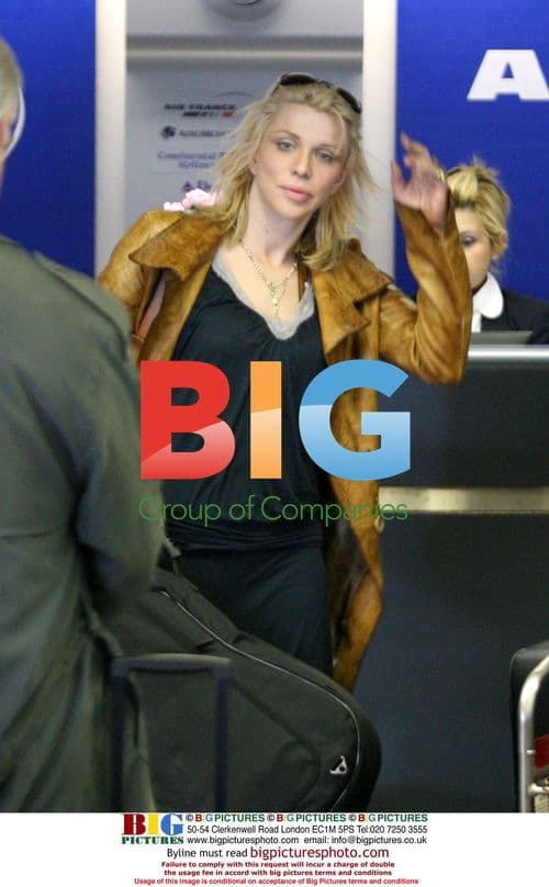 Courtney Love Looks Dazed at LAX