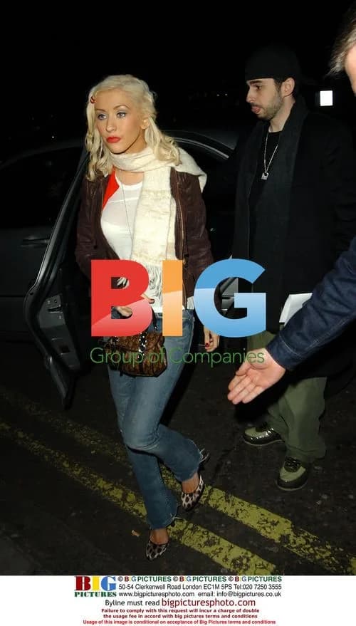 Christina Aguilera and husband leaving hotel in London