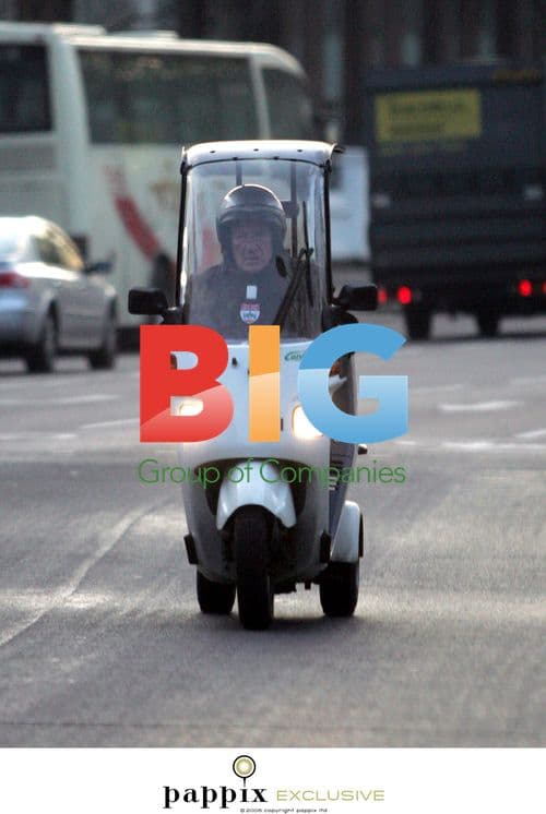 Sir Sterling Moss Spotted on 3-Wheeled Moped in London