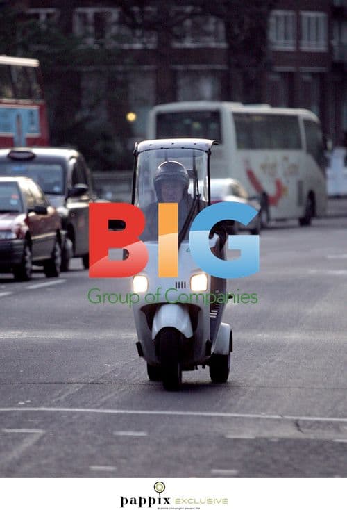 British F1 Legend Sir Sterling Moss on 3-Wheeled Moped
