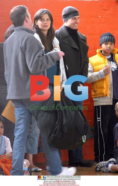 Tom Cruise and pregnant fiancee attend daughter's basketball game