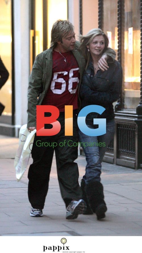 Darren Day looks bored with girlfriend in London