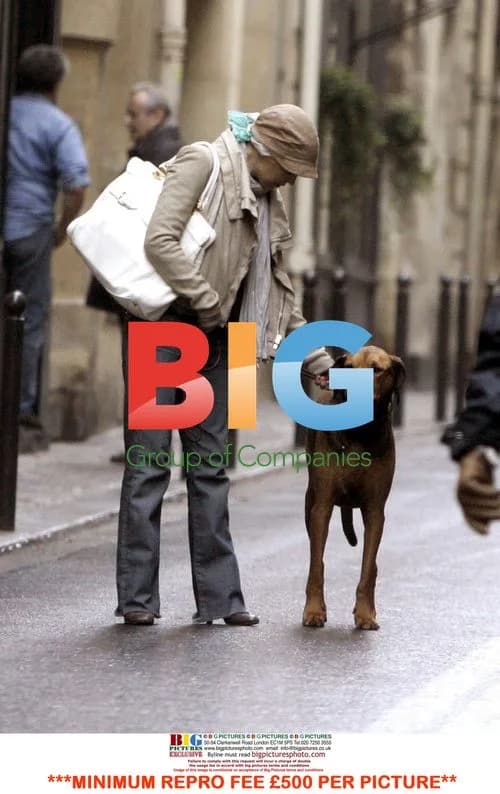 Kylie Minogue Strolls in Paris with Friend