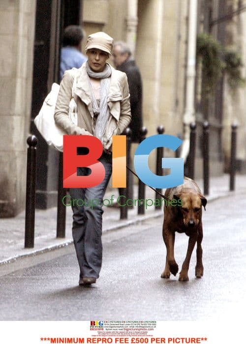 Kylie Minogue strolls in Paris with friend and dog