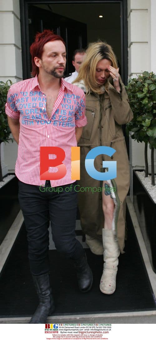 Singer Pete Burns Escorted from Hotel