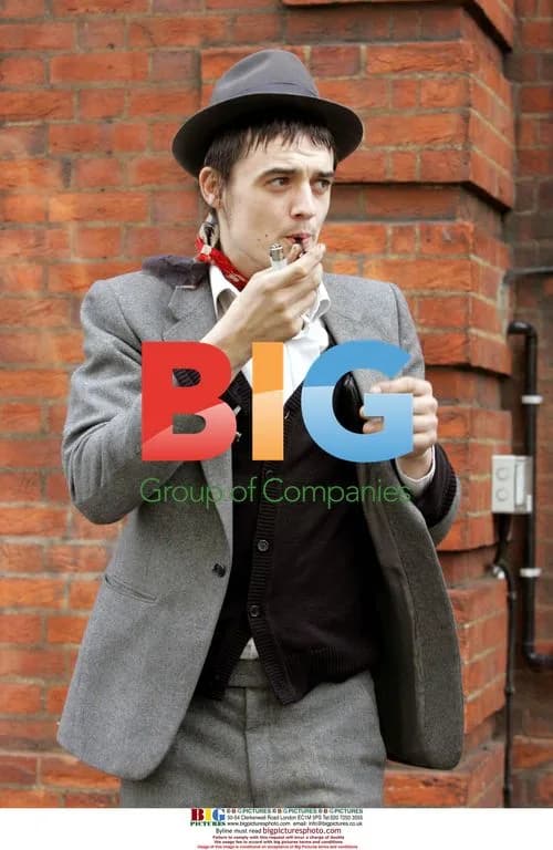 Pete Doherty smokes after leaving home