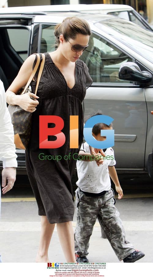 Angelina Jolie and son Maddox leaving Paris hotel