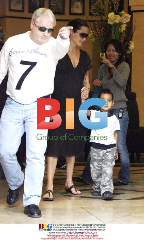 Angelina Jolie and son Maddox leaving hotel in Paris