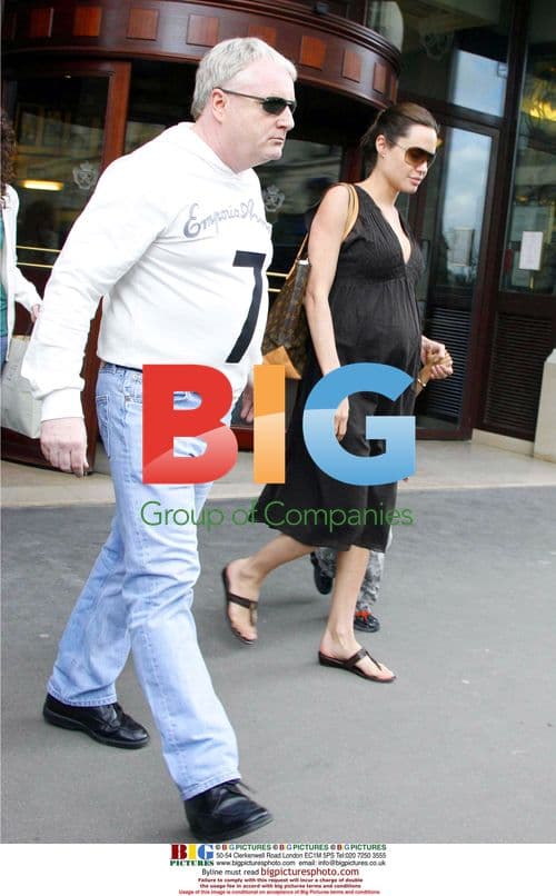 Angelina Jolie and son Maddox leaving hotel in Paris