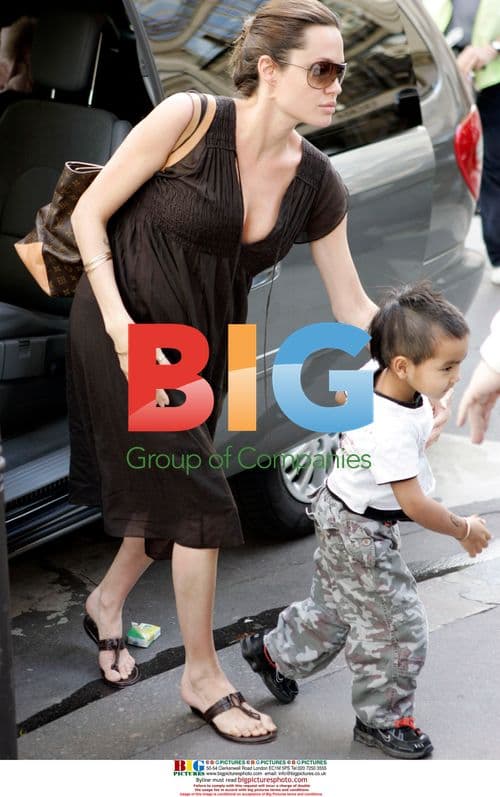 Pregnant Angelina Jolie with son Maddox in Paris