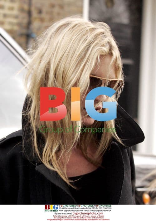 Kate Moss Arrives Home with Daughter Lilia-Grace
