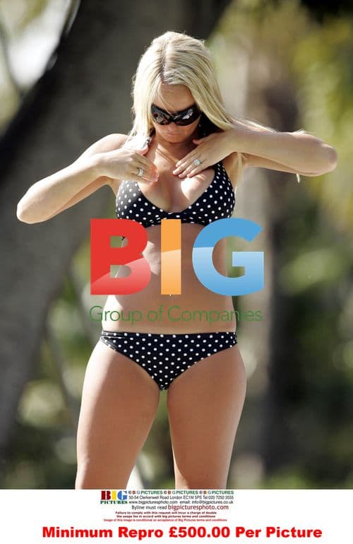 Jennifer Ellison strips off in Spain