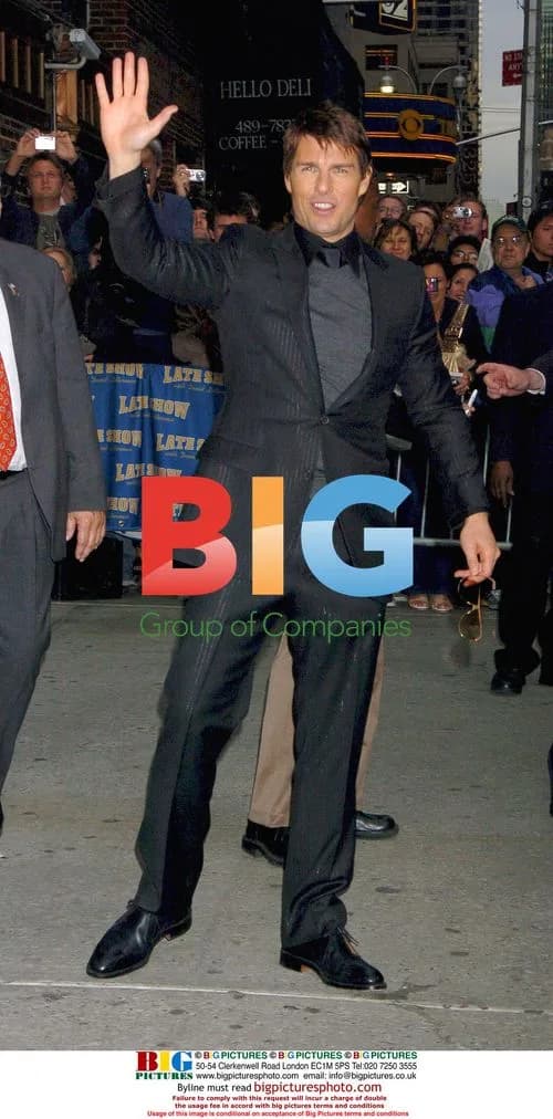 Tom Cruise waves to fans in New York