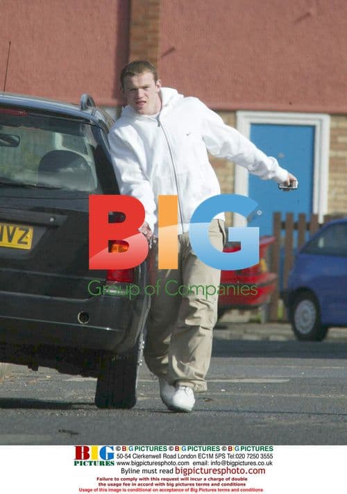 Wayne Rooney Loses Balance Walking Past Car