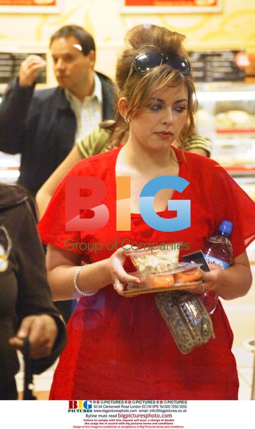 Singer Charlotte Church Snacks on Walkers Crisps