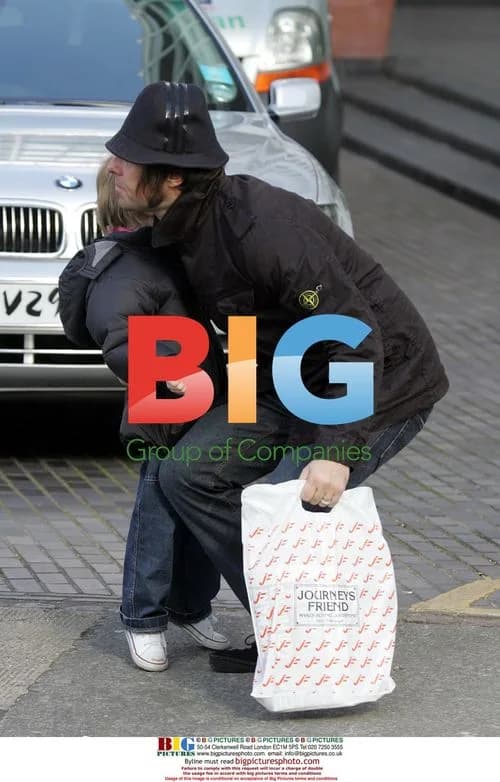 Liam Gallagher carries son Gene