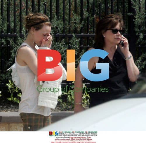 Hilary Duff Unhappy Waiting for Car in Burbank