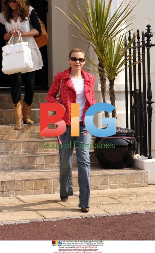 Kylie Minogue Leaves Hotel for Album Work
