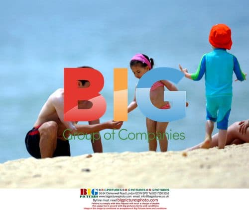 England Team Players with Families at the Beach