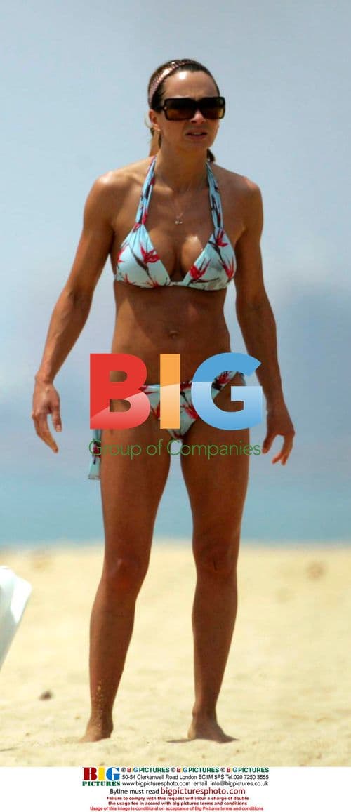 England team-members with families on beach