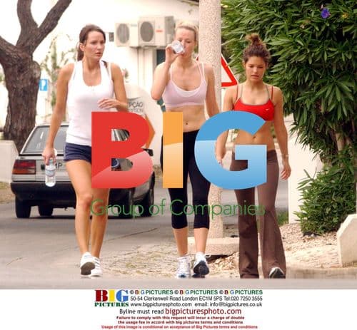 England Football Players' Girlfriends Jog and Read Papers