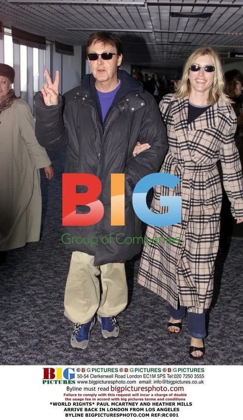 Paul McCartney and Heather Mills Arrive in London